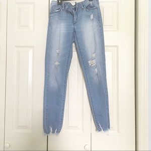 Distressed ripped skinny denim jeans